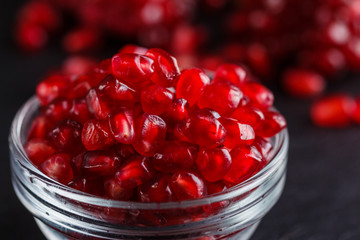 grains of a grenade on a dark rustic background