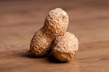 Peanut on wooden table.Healthy food and snack.