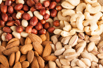 mix of nuts on a wooden table