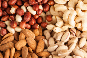 mix of nuts on a wooden table