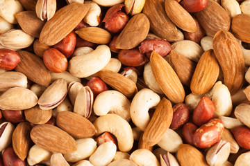 mix of nuts on a wooden table