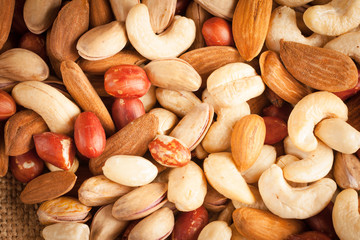 mix of nuts on a wooden table