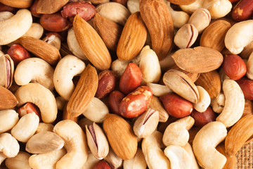mix of nuts on a wooden table