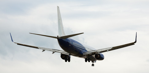 modern passenger plane lands at airport