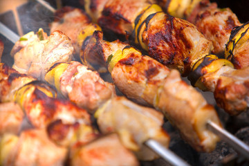 tasty barbecue meat on the grill outdoors