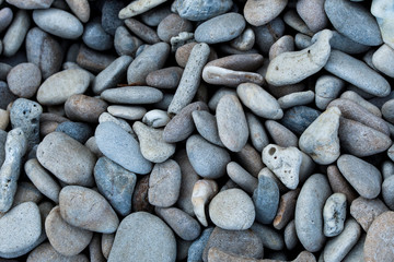 Rocks on the beach.stone and white sand.Blurred and soft focus.