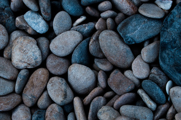 Rocks on the beach.stone and white sand.Blurred and soft focus.