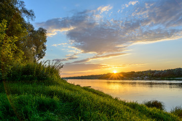 Fototapeta na wymiar Sunset on the river. Bank of the Oka River. Summer evening
