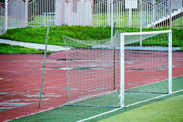 Football gate on the old empty stadium.