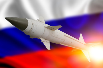 rocket with a warhead against the background of the flag of the Russian Federation