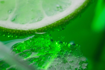 mint and lime in cocktail close-up