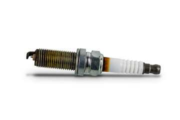 Car spark plugs that have been used for more than 10,000 kilometers isolated on white