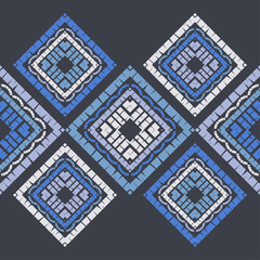 Ethnic boho seamless pattern. Embroidery on fabric. Patchwork texture. Weaving. Traditional ornament. Tribal pattern. Folk motif. Can be used for wallpaper, textile, invitation card, wrapping, web.