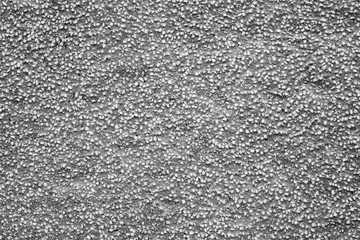 Fototapeta premium Abstract monochrome stone texture of small pebbles