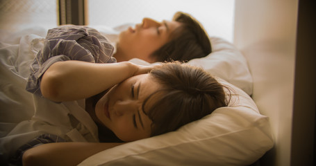 Obraz na płótnie Canvas いびき・睡眠・女性