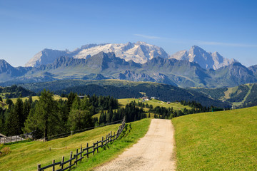 panorama in val Badia, Dolomiti. Sullo sfondo la Marmolada - obrazy, fototapety, plakaty