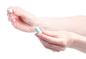 Green ear plugs in hand on white background isolation