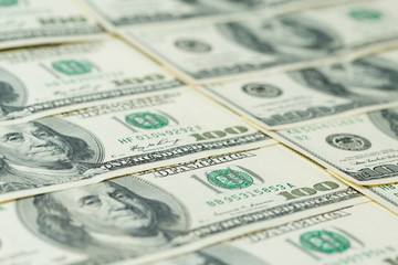 Background of one hundred dollar bills. Benjamin Franklin on USA money banknote	