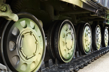 Obraz na płótnie Canvas the chassis of a military tank close view