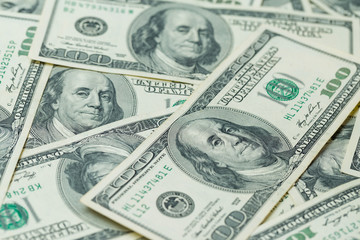 Background of one hundred dollar bills. Benjamin Franklin on USA money banknote