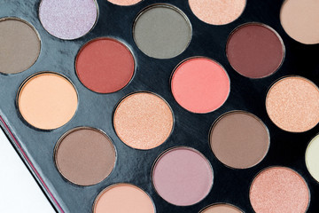 Colorful eye shadows palette. Colorful make-up palette background.