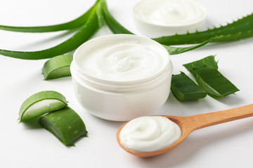 Composition with natural treatment accessories on light background, closeup. Aloe vera