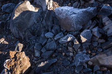 Lava stones with ice cover in the morning