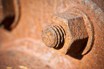 Old rusty bolt with threaded metal bar - image with copy space