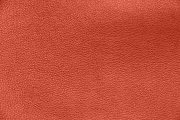 Fototapeta premium Texture of genuine leather. Brown color background. Close-up of the leather structure.