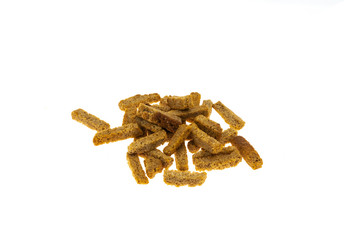 Dry croutons isolated on white background. beer snack
