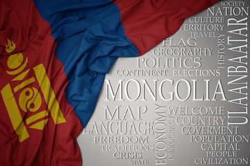 waving colorful national flag of mongolia on a gray background with important words about country