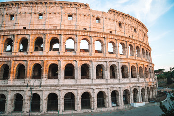 Fototapeta na wymiar Colosseum or Coliseum background blue sky in Rome