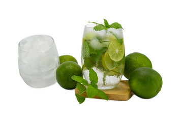mojito cocktail with lime and mint in glass