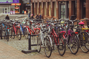 Obraz premium Bicycle Parking in the Finnish city of Jyvaskyla. many bicycles of different colors