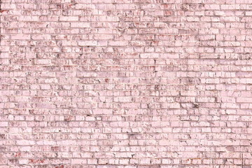 Fototapeta na wymiar Unusual bright saturated abstract pink background from old brick wall in retro style