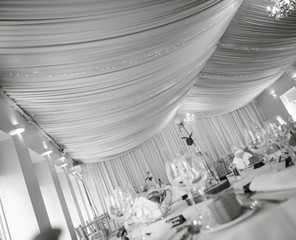 Tables set for a wedding with favours