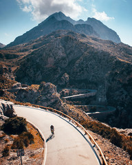 Man ride on bicycle in Famous Sa Calobra Climb in Mallorca Original sport wallpaper