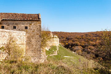 Fototapeta na wymiar Old stone houses of Medieval cave city-fortress Chufut-Kale in the mountains, Bakhchisaray, Crimea