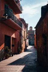 One of the charming streets decorated with flowers in Alcudia, Majorca, Spain