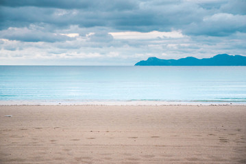 Fototapeta na wymiar Empty clear beach in autumn morning. Depression, Sadness, Melancholy concept photo