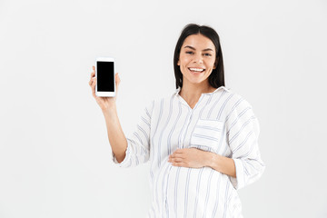 Naklejka premium Smiling young pregnant businesswoman