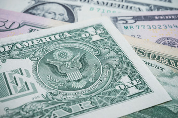 US dollar banknotes bill background focus on "Great Seal of the United States" on the reverse of a United States one dollar banknotes bill. USA or global World economic and financial business concept.