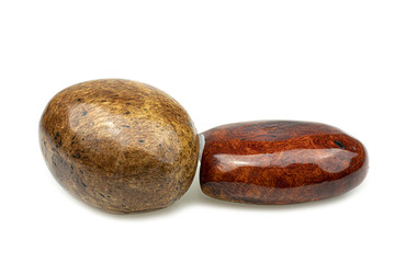 Egg made of wood nature for paperweight, exotic wooden beautiful pattern on white backgroung