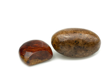 Egg made of wood nature for paperweight, exotic wooden beautiful pattern on white backgroung