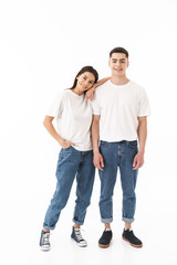 Fototapeta premium Full length of a young casual wear couple standing