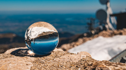 Fototapeta na wymiar Crystal ball alpine landscape shot at the famous Wendelstein summit-Bayrischzell-Bavaria-Germany