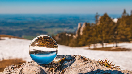 Crystal ball alpine landscape shot at the famous Kampenwand summit-Aschau-Chiemgau-Bavaria-Germany
