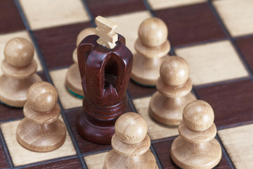 Business concept of win or defeat, loss Chessboard and figures of the king and pawns.