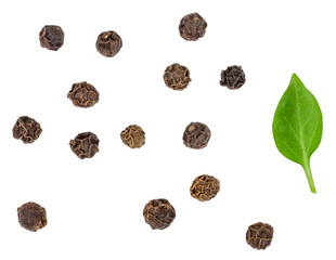 Black peppers peas isolated on white, top view