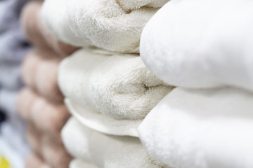 Stack of towels in a shop. Soft focus.